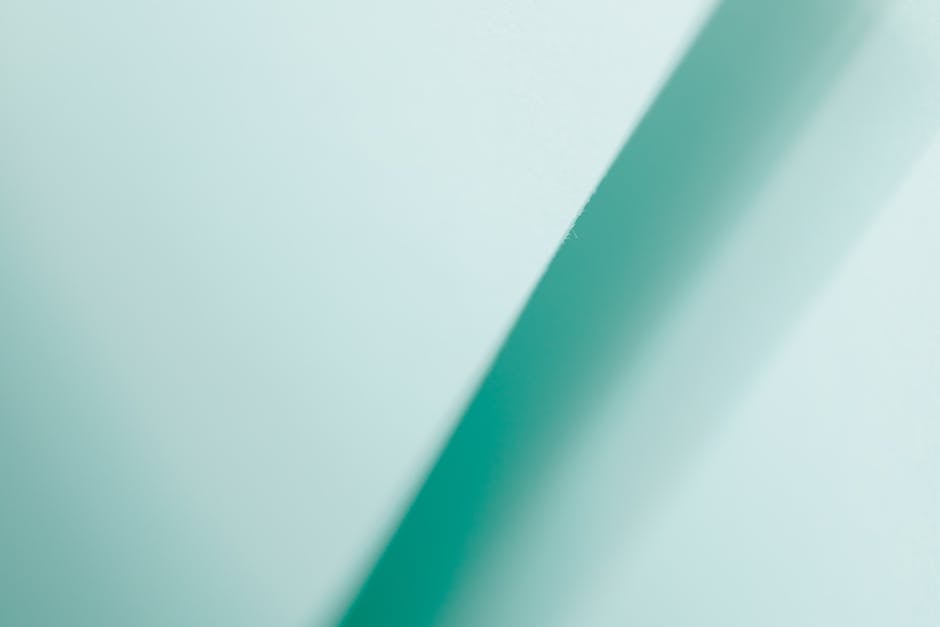 Teal abstract geometric shapes